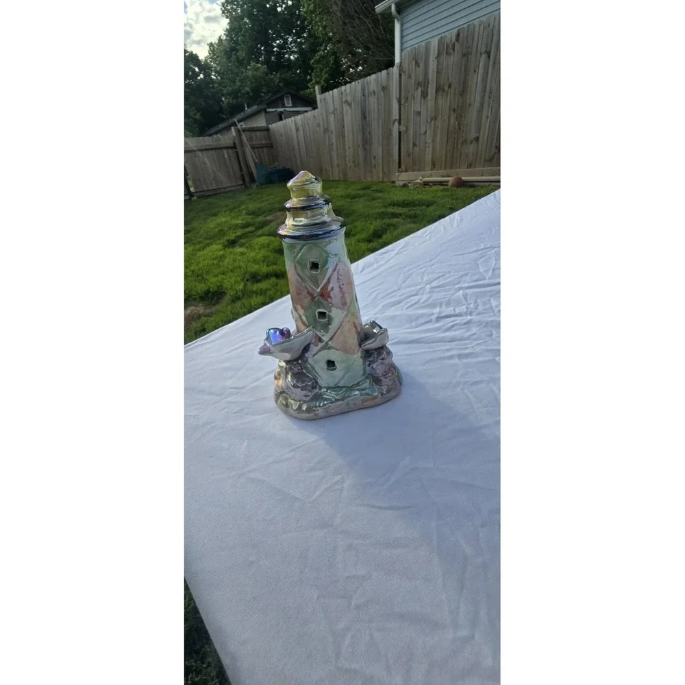vintage iridescent ceramic dolphin lighthouse figurine